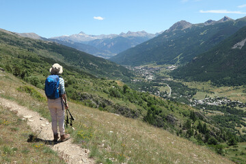 Hiker on a path in the Ecrins National Park.