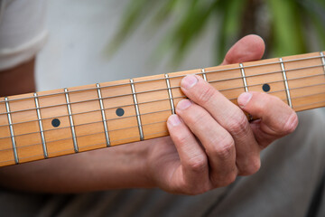 Close-up: Electric Guitar Chord in Focus