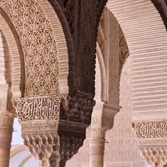 Richly detailed Arabic style wall decorations in the Royal Nazaries Palace in Alhambra, Granada,...