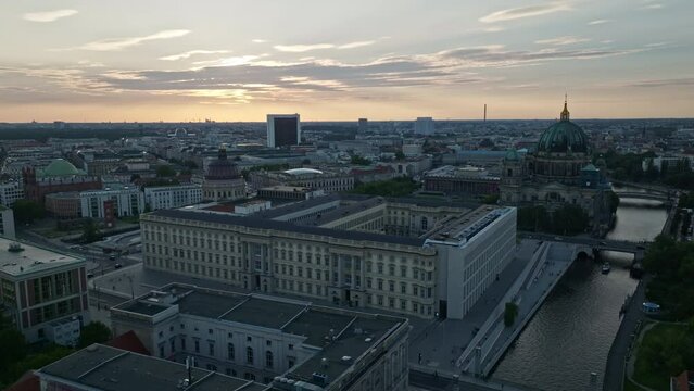 Aerial Drone shot of Berlin city centre ( Berliner Mitte )  at sunset . Spree river , Berlin , Germany . 