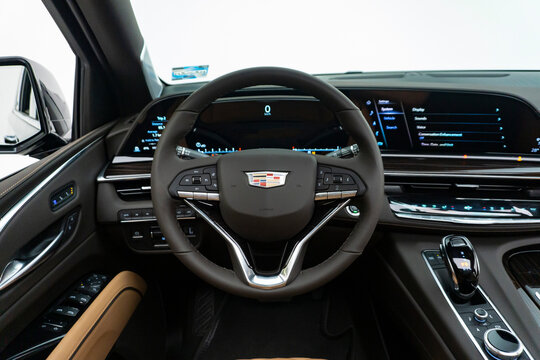 Cadillac Escalade 2023 steering wheel focused shot, car in studio - High Resolution Image
