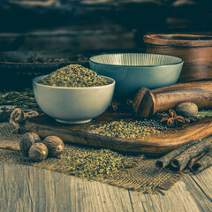 LEMON PEPPER SEASONING on wooden table background. Herbs, spices and dried food baking ingredient....