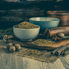 PIRI PIRI SEASONING on wooden table background. Herbs, spices and dried food baking ingredient....