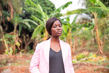 Portrait of a serious young African businesswoman outdoors
