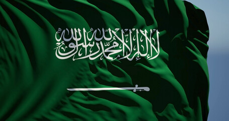 Close-up of the national flag of Saudi Arabia flutters in the wind on a sunny day - 775110719