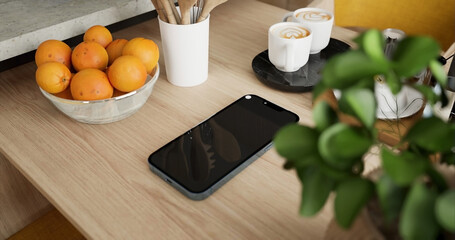 Smartphone place on kitchen table , Close up display mobile phone with mock up, - 775113729