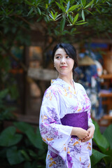 portrait woman with yukata dress in the garden - 775117910