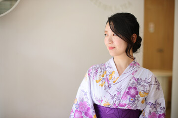 Japanese woman in a yukata - 775118131