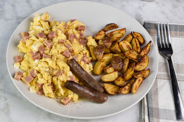 scramble eggs  mixed with spam  with home fries
