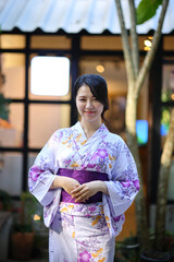 portrait woman with yukata dress in the garden - 775122776