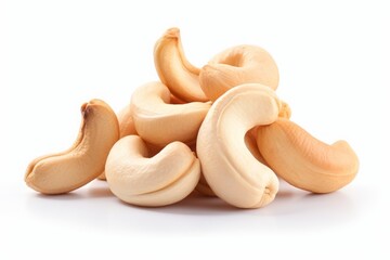 cashews. a bunch of peeled nuts on a white background. a healthy vegan product. - obrazy, fototapety, plakaty