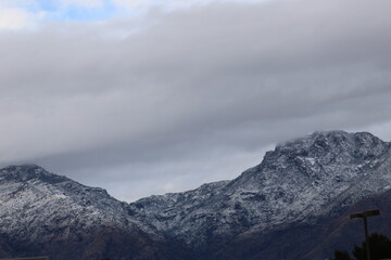 Snowy Mountains Under Overcast Skies