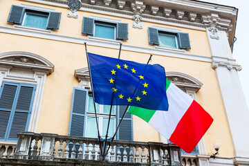 Italian and European union flags at building in Rome, Italy. - 775130319