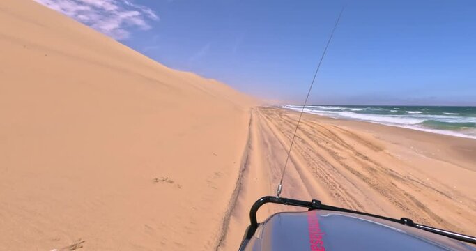 Video of a drive with a four-wheel drive vehicle over the beach of Sandwich Harbor in Namibia