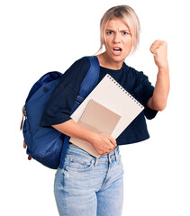 Young beautiful blonde woman wearing student backpack holding notebook annoyed and frustrated shouting with anger, yelling crazy with anger and hand raised