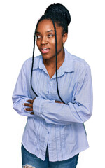 Young african american woman wearing casual clothes with hand on stomach because nausea, painful...