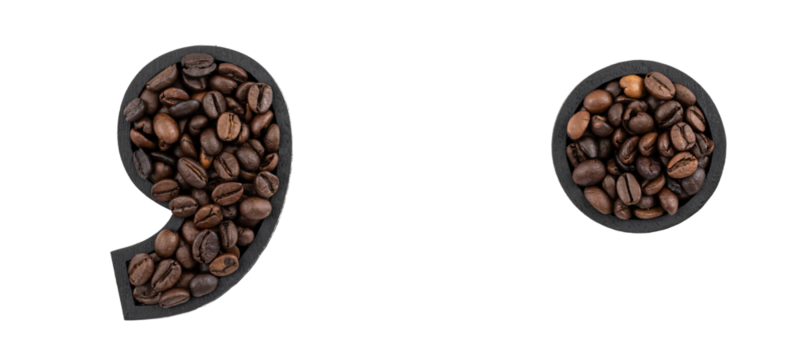 Point and comma marks made with coffee beans isolated on transparent background.