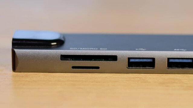 Laptop USB Type-C adapter with different connectors for connecting devices.