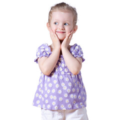 Portrait of a beautiful darling kid girl looking smiling, hands on cheeks on white background isolation