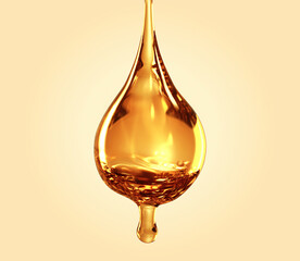 Closeup drop of golden oil isolated on light background