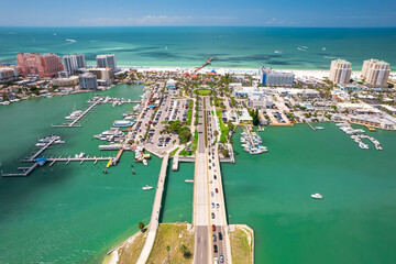 Florida beaches. Clearwater Beach Florida. Panorama of city. Spring or summer vacations. Beautiful view on Hotels and Resorts on Island. Blue color of Ocean water. American Coast. Gulf of Mexico shore
