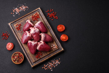 Raw turkey or chicken hearts with salt and spices