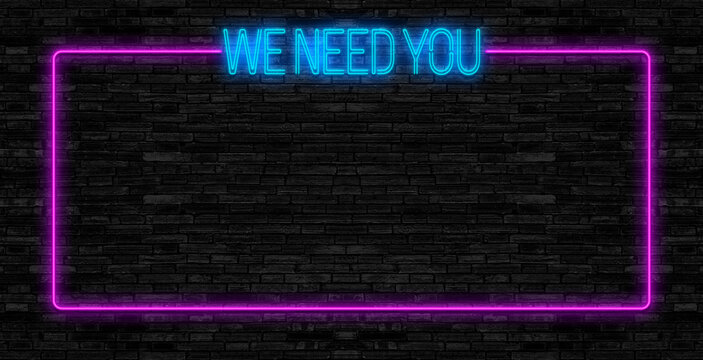 We need you. Neon sign. Brick wall at night with the text "We need you" in blue neon letters. Announcement message, hiring, recruitment and motivation. 3D illustration 