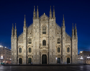 Fototapeta na wymiar MILAN, ITALY - MARCH 4, 2024: The westfacade of Duomo - cathedral at dusk