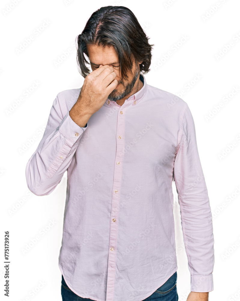 Wall mural Middle age handsome man wearing business shirt tired rubbing nose and eyes feeling fatigue and headache. stress and frustration concept.