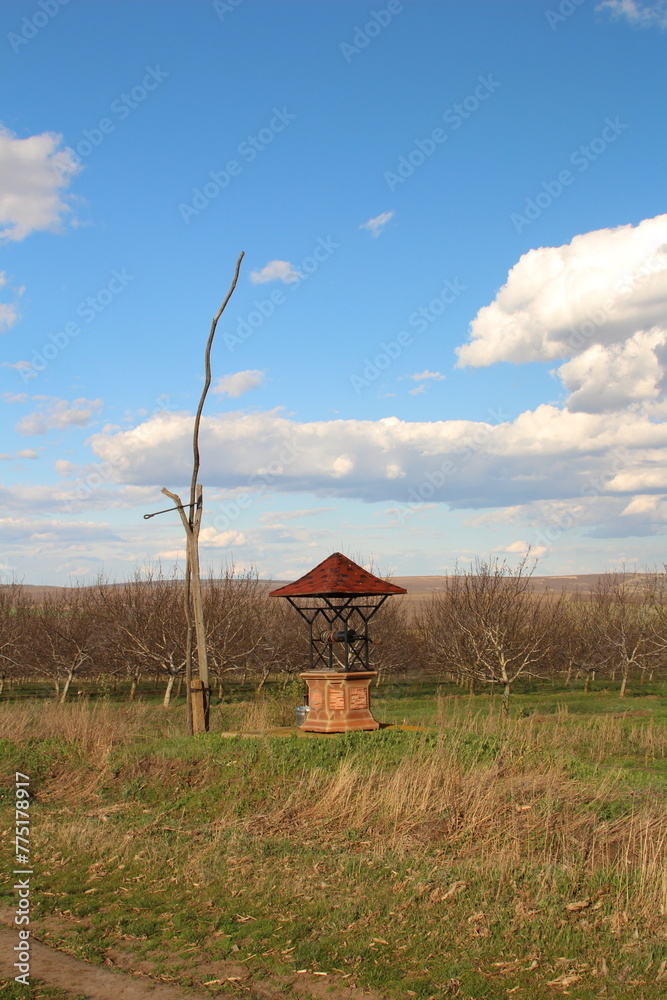 Wall mural A small structure in a field