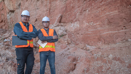 Geologist surveying mine,Explorers collect soil samples to look for minerals.