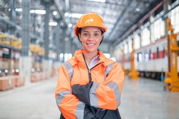 Portrait of a female engineer Take care of the electric locomotive maintenance shop