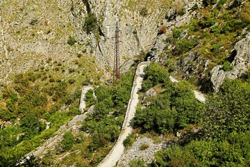 Fototapeta na wymiar Ancient serpentine road in the mountains of Montenegro, Kotor