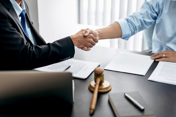 Handshake after good cooperation, Two people shaking hands after discussing contract agreement on...