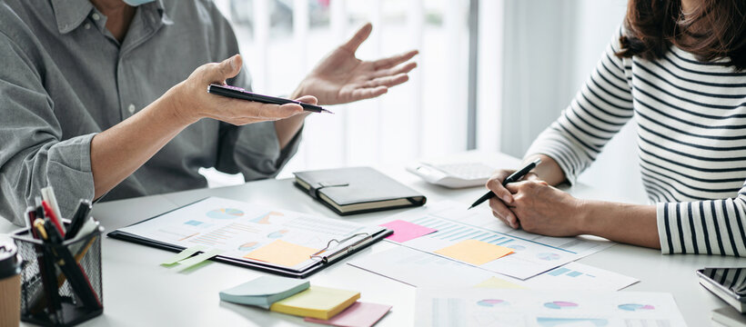 Business team colleagues consultation and discussion marketing plan meeting on the financial report and analyzing investment project to development grow to success