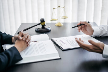 Male lawyer or notary working consulting and discussion to businesswoman client in the office, Law and Legal services concept - obrazy, fototapety, plakaty