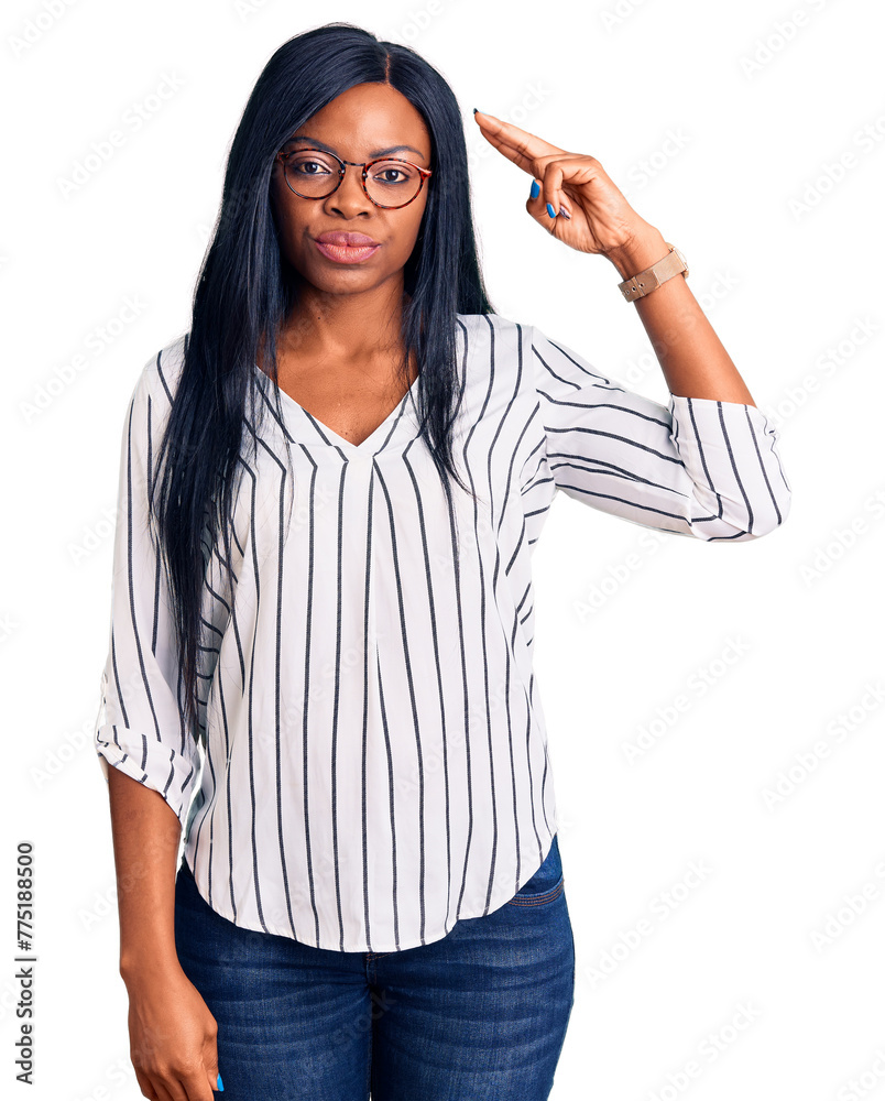 Sticker Young african american woman wearing casual clothes and glasses shooting and killing oneself pointing hand and fingers to head like gun, suicide gesture.