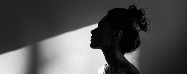 Silhouette of a woman with shadow play