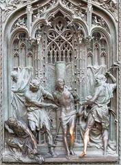 Küchenrückwand glas motiv MILAN, ITALY - SEPTEMBER 16, 2024: The detail from main bronze gate of the Cathedral - Flagellation -  by Ludovico Pogliaghi (1906). © Renáta Sedmáková