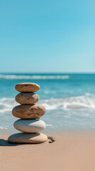Zen stones on a sandy beach