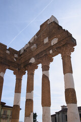 Ruins of ancient Roman temple. Detail of the Capitolium in the Roman forum. Brescia, Italy - obrazy, fototapety, plakaty