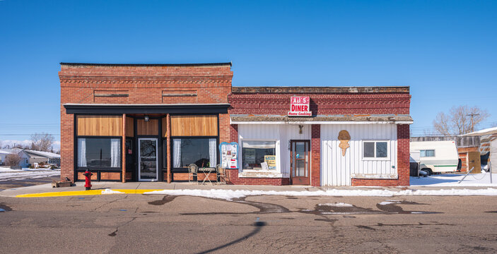 Nanton, Alberta - March 30, 2024: Old brick storefront in downtown Nanton.