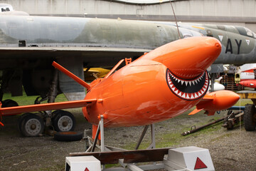 Old military planes. Airplane Museum. Air Force. Orange rocket
