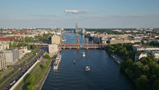 Aerial Drone shot of The Oberbaum Bridge (Oberbaumbr&uuml;cke) . It is a double-deck bridge crossing Berlin's River Spree, considered one of the city's landmarks. 