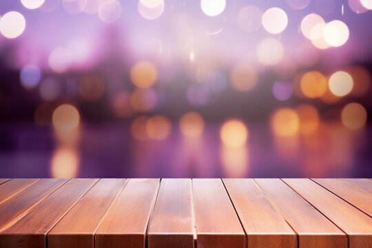 Empty wooden planks or tabletop in front of a blurred bokeh purple background with water drops and modern background a product display background or wallpaper concept with backlighting 