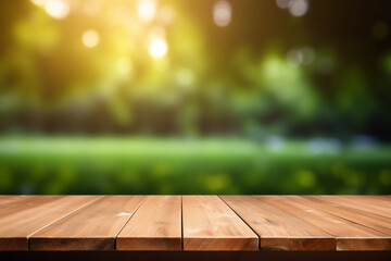 Empty wooden planks or tabletop in front of a blurred bokeh green background and modern background a product display background or wallpaper concept with front-lighting 
