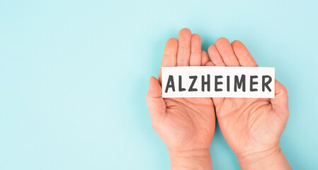 Alzheimer stands on a paper, awareness day, dementia diagnosis, Parkinson´s disease, memory loss brain disorder - 775229742