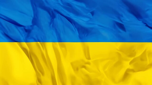 The national Ukraine waving flag in 3d background.