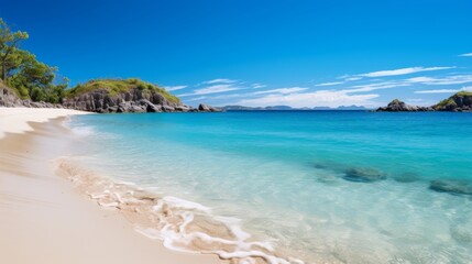 Obraz premium Pristine beach with sparkling waters and waves