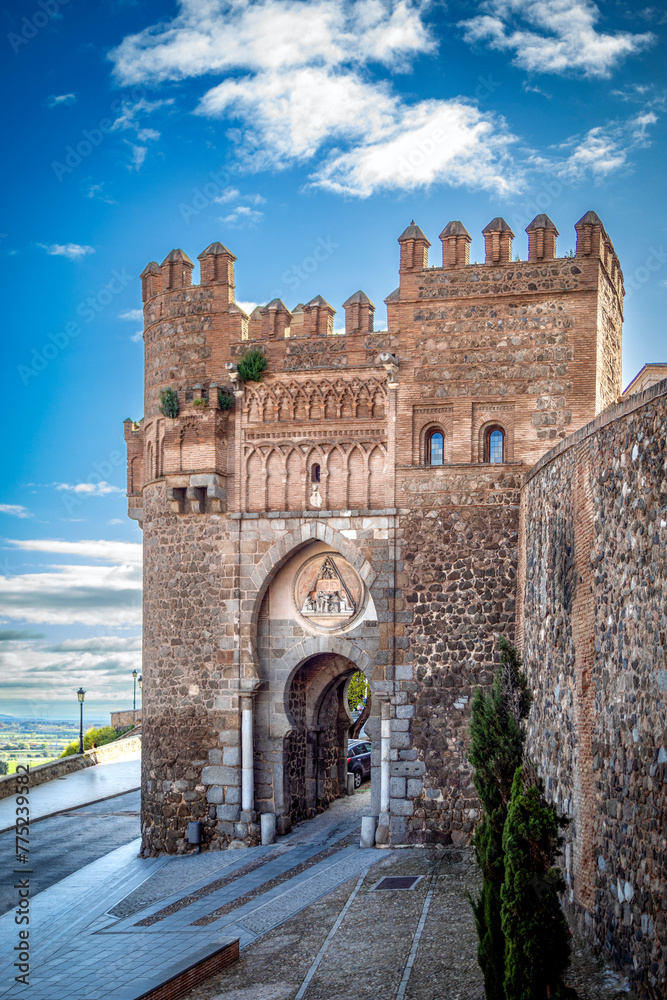 Wall mural vertical view of the puerta del sol in the medieval walled area of ​​toledo, castilla la mancha, spa